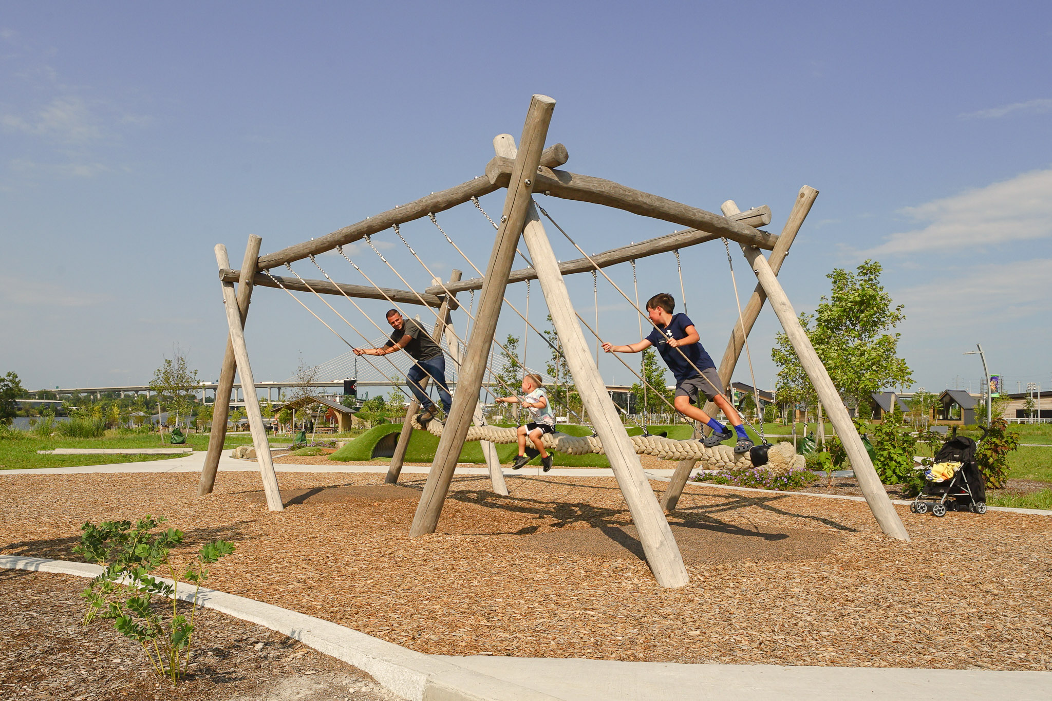 natural playground equipment group swings