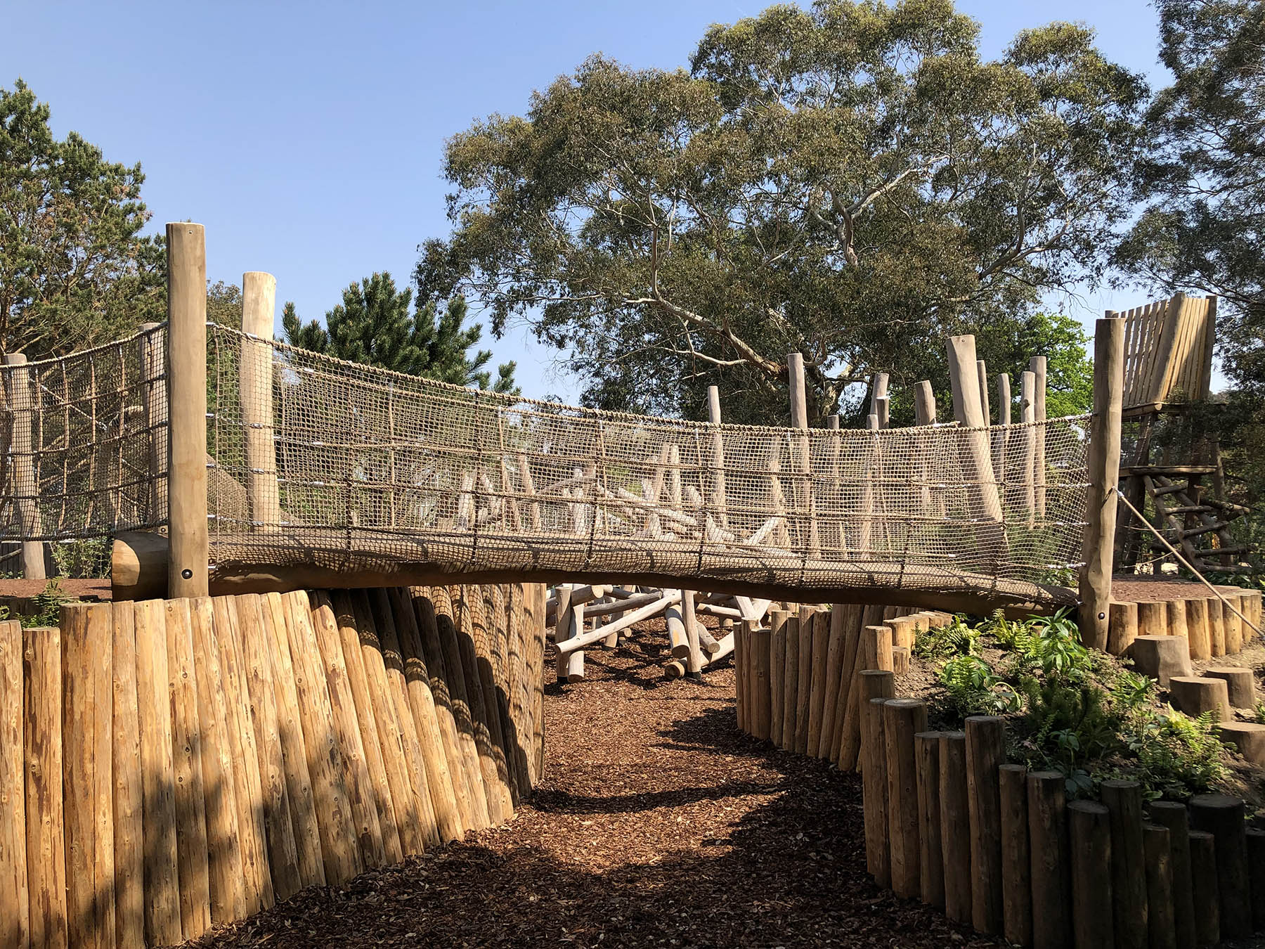 natural playgrounds log net bridge